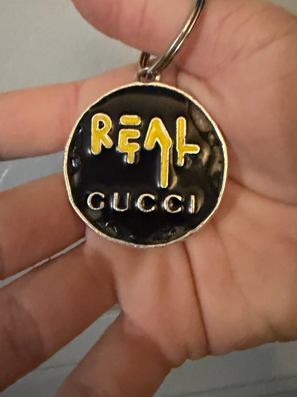 Gucci Ghost “Real Gucci” Enamel Keychain, sterling silver